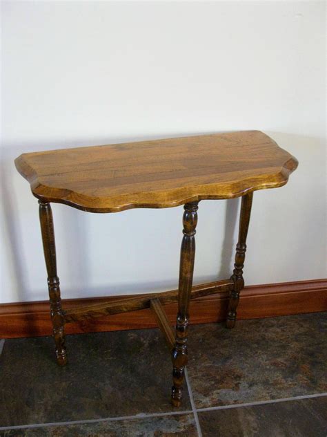 Vintage 3 legged half moon table. Things To Know About Vintage 3 legged half moon table. 